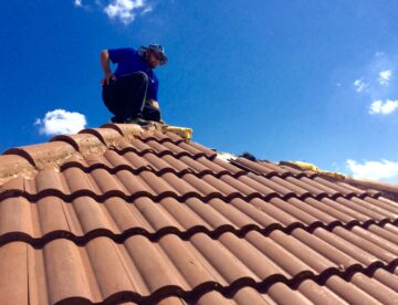 Inspector on a roof