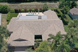 Top view of a Florida home roof and backyard pool