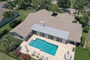 Top view of a Florida home roof and backyard pool